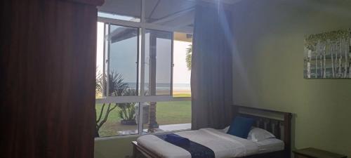 Papar Beachfront Viewにあるベッド