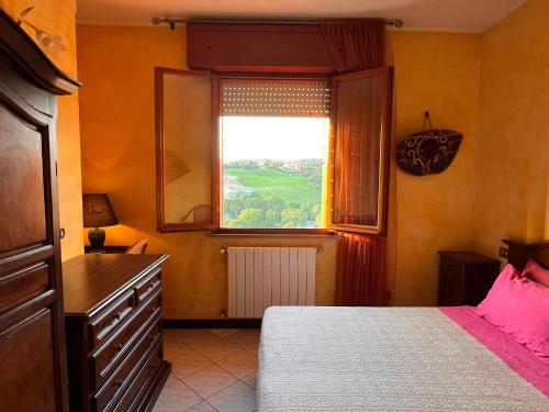 Katil atau katil-katil dalam bilik di Panoramic B&B