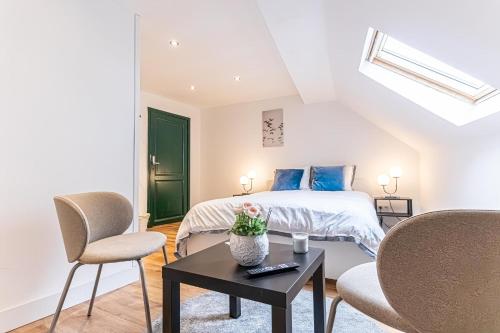 Ένα ή περισσότερα κρεβάτια σε δωμάτιο στο 6 Stylish & Comfortable Studios , Heart of Gent