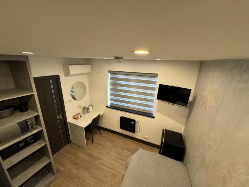 TV a/nebo společenská místnost v ubytování Park Avenue Hotel