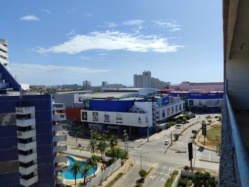 a view of a city from a building at LagunaSuite & More in Porlamar