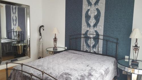 Ένα ή περισσότερα κρεβάτια σε δωμάτιο στο Deluxe Loft Mountain View
