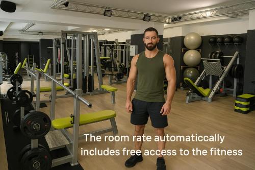 a man standing in a gym at More Than Accommodation in Bratislava