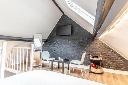 Ένα ή περισσότερα κρεβάτια σε δωμάτιο στο 6 Stylish & Comfortable Studios , Heart of Gent