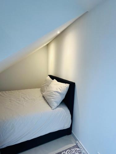Postel nebo postele na pokoji v ubytování Stijlvol en comfortabel appartement in rustige wijk