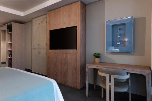 Cama o camas de una habitación en OZ Hotel Collection