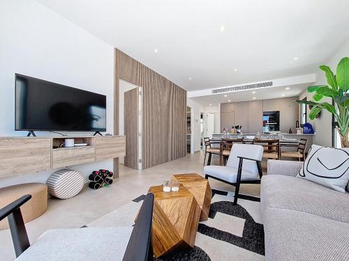 a living room with a couch and a tv at Villa Verano San Javier - 6610 in San Javier