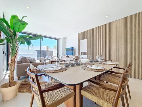 a dining room with a table and chairs at Villa Verano San Javier - 6610 in San Javier