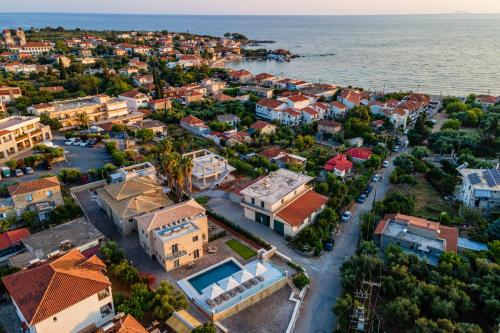 an aerial view of a town by the water at Ampeli Villas in Stoupa