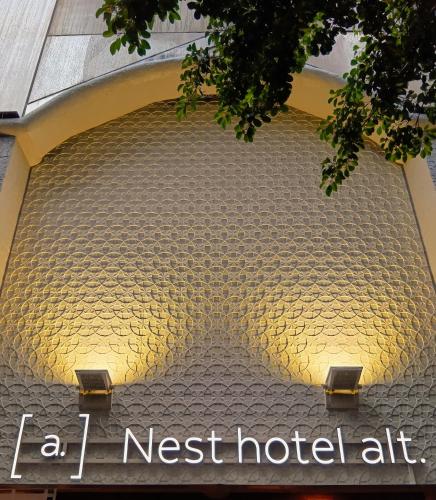 a building with the words la t nest hotel art at Nesthotel alt Kawasaki Station in Kawasaki