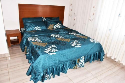 Katil atau katil-katil dalam bilik di Cool Homes & Apartment
