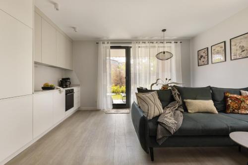 Χώρος καθιστικού στο Scala Apartamenty by Moderna Profit- Łąkowa 60E z parkingiem