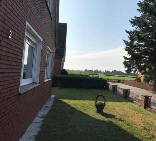 Κήπος έξω από το Ferienwohnung mit Seeblick 2