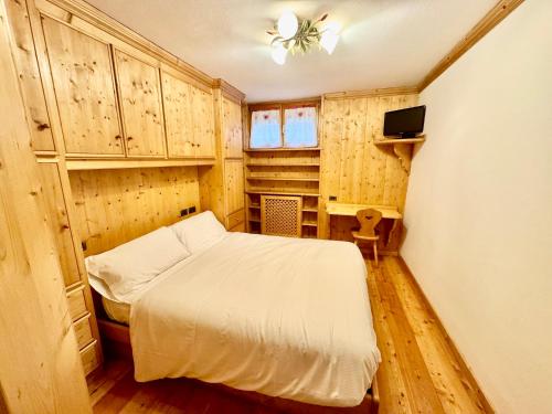 Katil atau katil-katil dalam bilik di Apartment Cortina d'Ampezzo -City center-