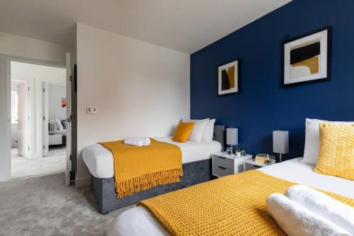 Katil atau katil-katil dalam bilik di Beaulieu Rest 3 Bed House Chelmsford