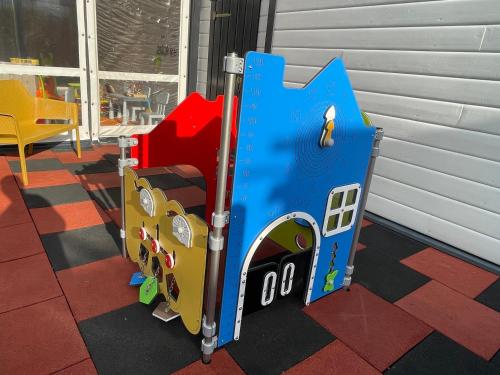 a childs play room with a toy train at Amelia Resort in Sianozety
