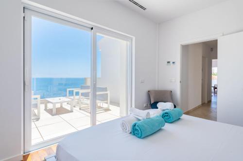 Postel nebo postele na pokoji v ubytování Villa Mediterraneo by Mallorca House Rent