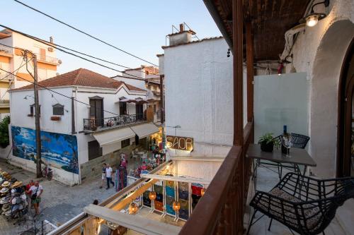 an overhead view of a street with buildings and people at Sea View Center in Limenas