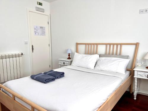 Letto o letti in una camera di Hostel do Alto - Fão