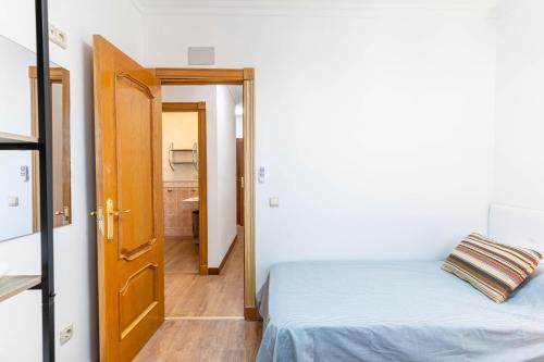 Postel nebo postele na pokoji v ubytování Casa Zaidín Beach R&R
