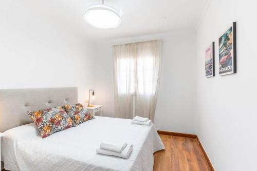 Postel nebo postele na pokoji v ubytování Casa Zaidín Beach R&R