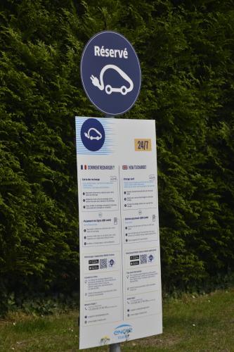 a sign for a preserve with a car on it at Premiere Classe Arras - Tilloy Les Mofflaine in Tilloy-lès-Mofflaines