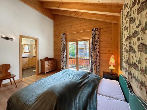 Katil atau katil-katil dalam bilik di Alpine Glow Retreat - 4 Valleys - Swiss Alps