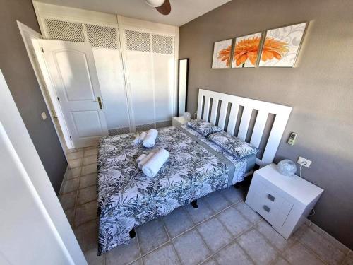 Ένα ή περισσότερα κρεβάτια σε δωμάτιο στο Charming Casa Betty Chayofa