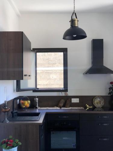 Kuchyň nebo kuchyňský kout v ubytování Charming loft in Cozzano