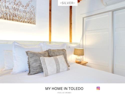 Postel nebo postele na pokoji v ubytování -SILVER- by myhomeintoledo