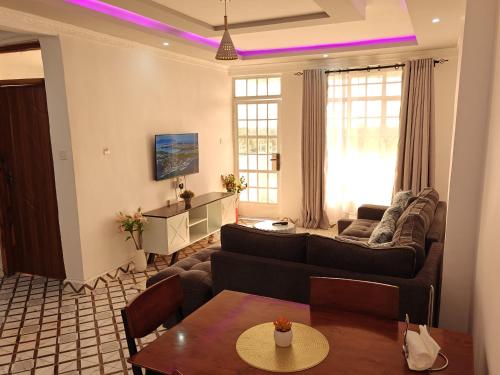 TV a/nebo společenská místnost v ubytování Haven Homes