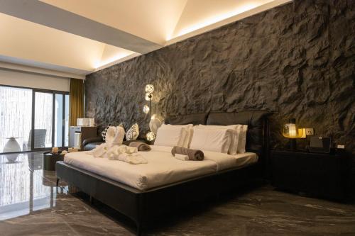 Voodi või voodid majutusasutuse YUSU Hotel 羽宿酒店 toas