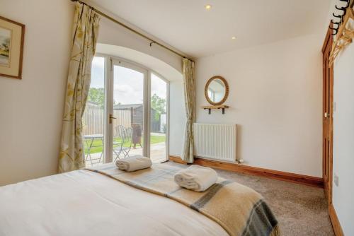 Katil atau katil-katil dalam bilik di 4 Bed in Cawton oc-t32408