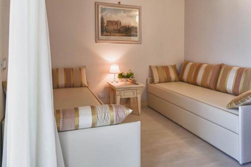 Uma área de estar em Hotel Conchiglia