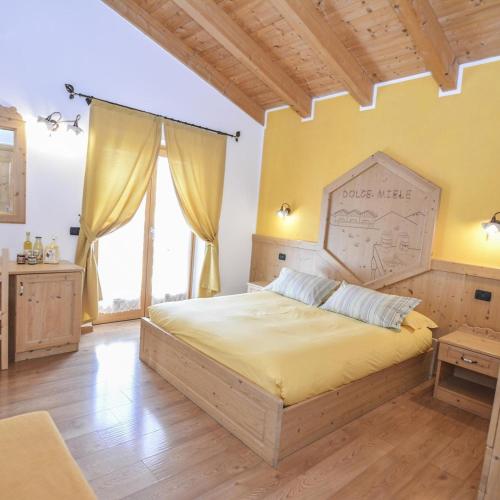 Postel nebo postele na pokoji v ubytování Agriturismo Maso le 4 stagioni