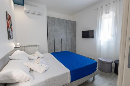 Postel nebo postele na pokoji v ubytování Dimora d'Autore
