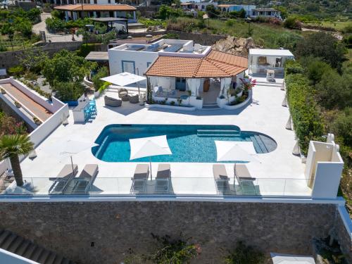 an aerial view of a villa with a swimming pool at Dolceterra Eolian Villas in Lipari