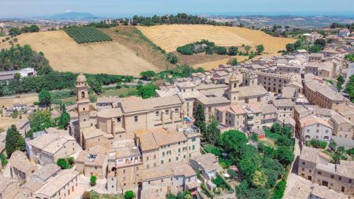 an aerial view of a town with a castle at Relax & Views in Le Marche by Host Hero in Morrovalle