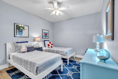 Ένα ή περισσότερα κρεβάτια σε δωμάτιο στο Palm Beach 602