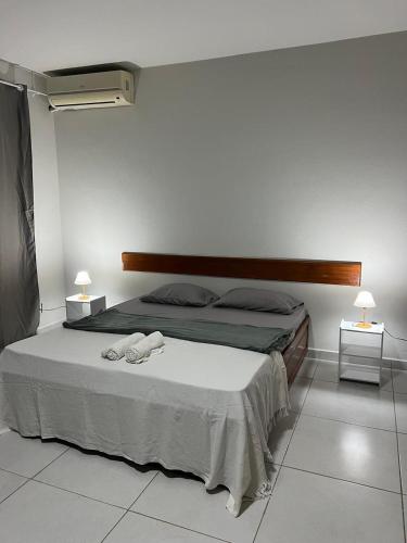 Katil atau katil-katil dalam bilik di Pousada Boa Praia