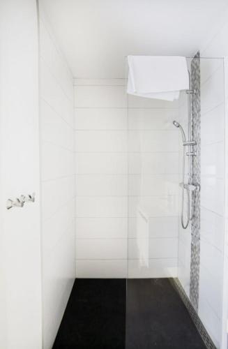 a shower in a bathroom with a glass wall at 302 Le Spot Neuvice in Liège