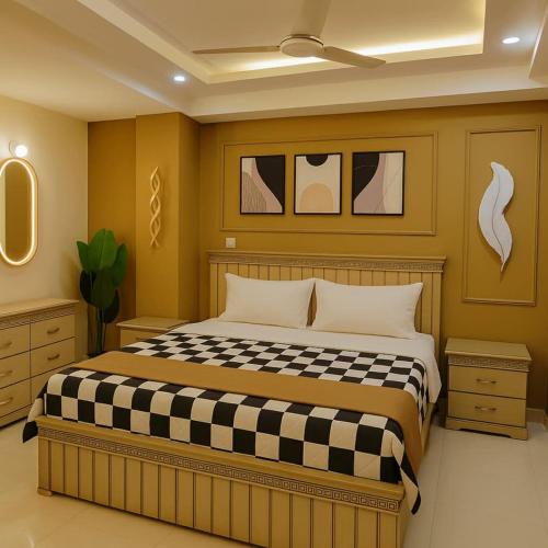 Ένα ή περισσότερα κρεβάτια σε δωμάτιο στο Neat Retreat -1BHK Full Apartment-E11 Islamabad-Netflix-AC-WiFi