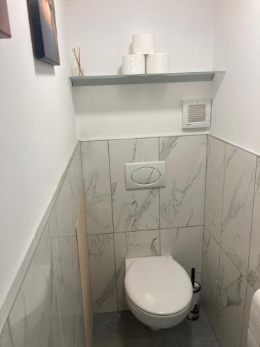 Koupelna v ubytování Hun Apartman