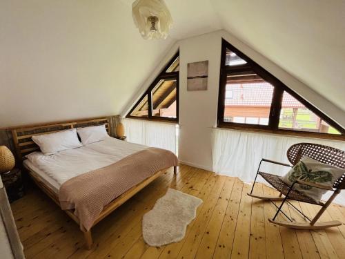 Ένα ή περισσότερα κρεβάτια σε δωμάτιο στο Domek na Kaszubach 15-2 - Ostoja Bukowo