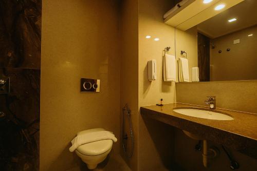 Koupelna v ubytování RION - A Boutique Hotel