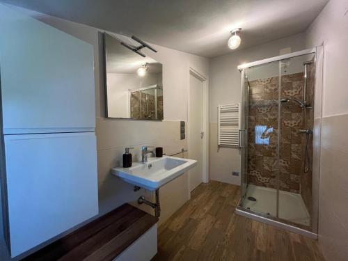 a bathroom with a sink and a shower at La Graziosa in Arezzo