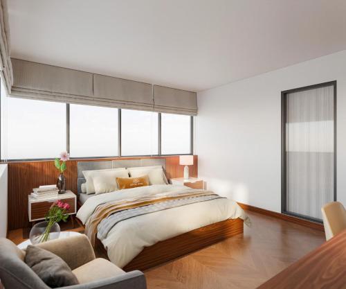 Ένα ή περισσότερα κρεβάτια σε δωμάτιο στο LUXTEL HOTEL Thành Phố Giao Lưu