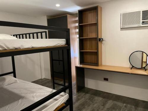 Ένα ή περισσότερα κρεβάτια σε δωμάτιο στο Abel's place transient