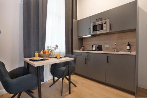 Η κουζίνα ή μικρή κουζίνα στο Zentrale Apartments I home2share