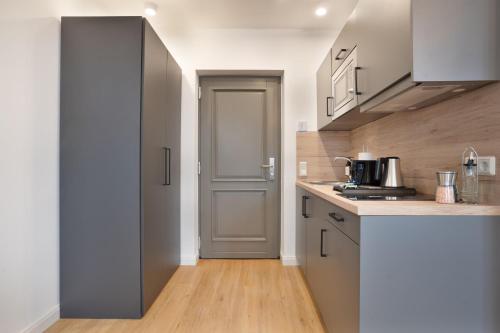 Η κουζίνα ή μικρή κουζίνα στο Zentrale Apartments I home2share